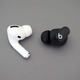 The Beats Studio Buds (right) have a more subtle design and more comfortable fit than AirPods Pro (left).